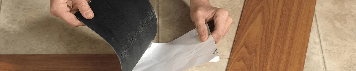 A professional installing vinyl flooring in Springfield, MO